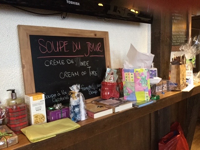 A ledge displayed the many raffle prizes that our members so generously donated