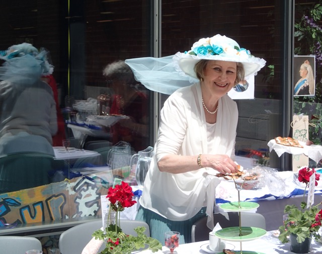 Timmy helps with setting up the tables